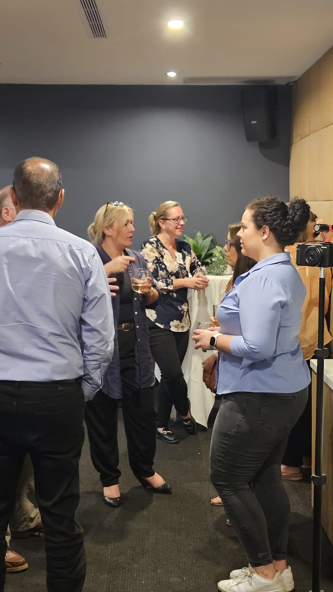 Toolbox guests enjoying a relaxed conversation